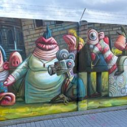 V Ruzyni vznikl největší mural v Česku. Na stěně dlouhé 700 metrů pracovalo 30 umělců z Česka i zahraničí